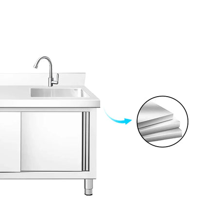 Stainless steel commercial sink with faucet and layered metal construction detail