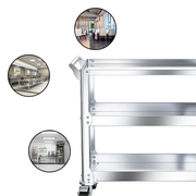 Three-tier service trolley with folded shelf edges and castors