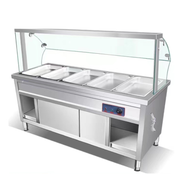 Stainless steel serving counter with curved customer-side glass