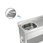 Stainless steel commercial sink with drainboard, showcasing durable layered construction for industrial kitchens